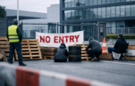 Protestors blocking gate